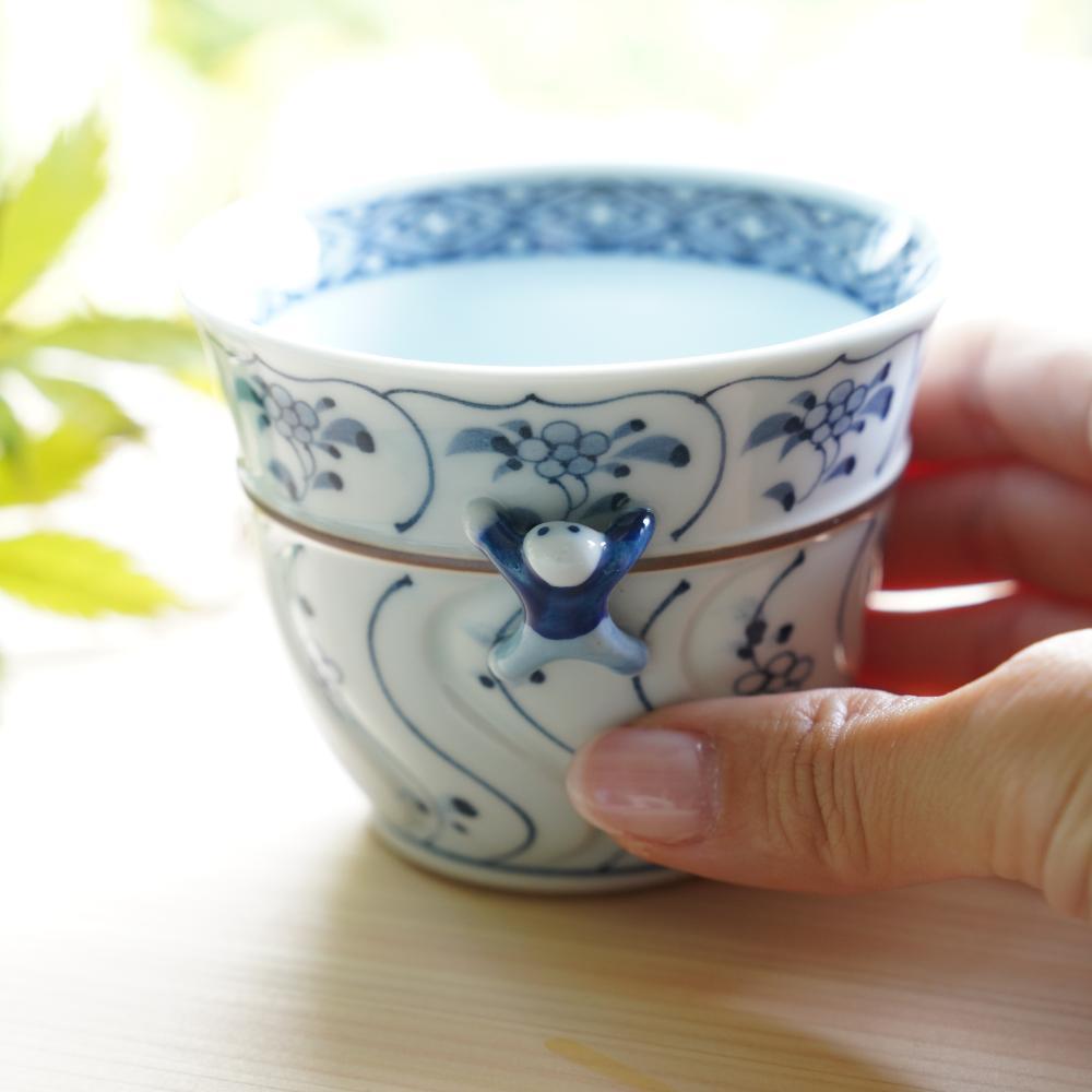 ARITA WARE "IKKANNJIN" CARVED TEACUP WITH WILD FLOWERS (BLUE)