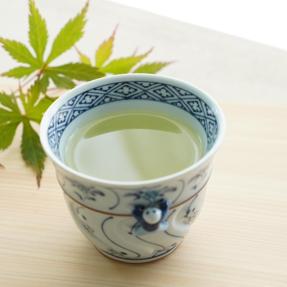 ARITA WARE "IKKANNJIN" CARVED TEACUP WITH WILD FLOWERS (BLUE)